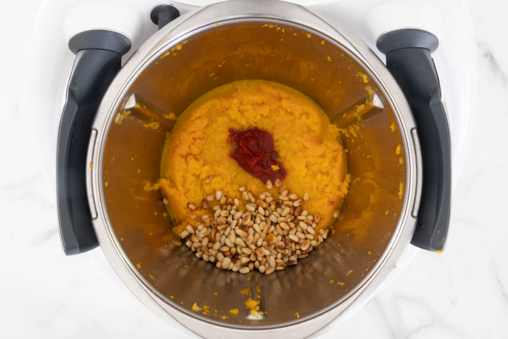 Step 4 of Butternut Squash Pasta process in a Thermomix, adding remaining ingredients.