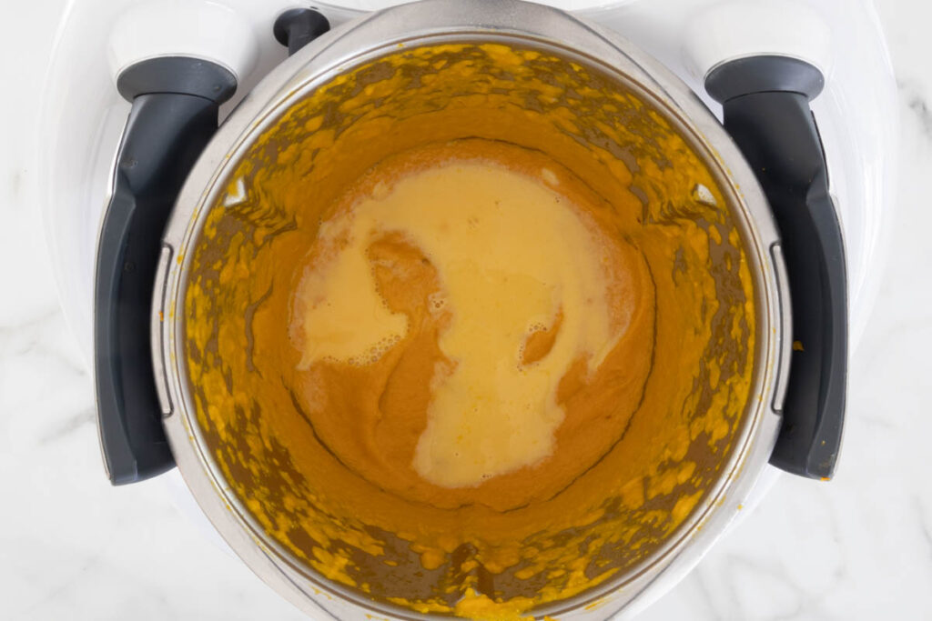 Step 6 of Butternut Squash Pasta process in a Thermomix, adding the milk.